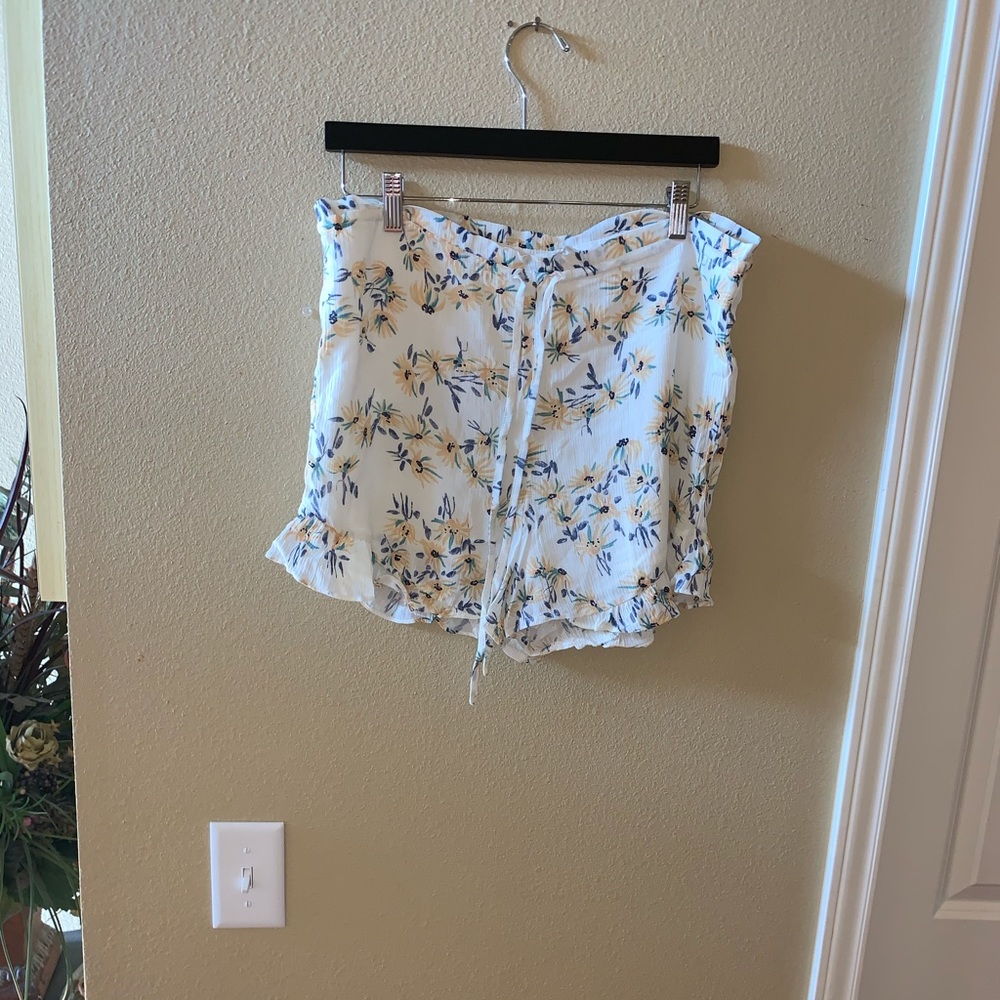 White shorts with yellow flowers